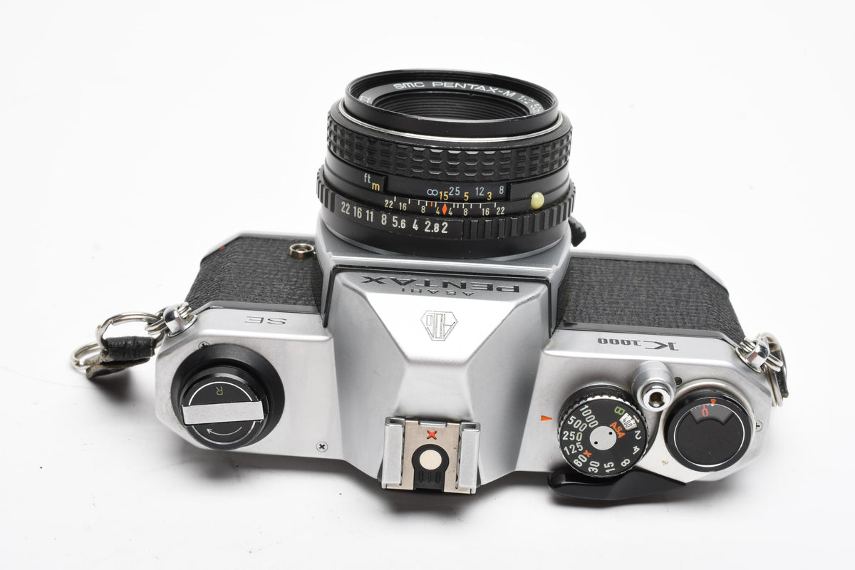 Pentax K1000 SE 35mm SLR w/50mm f2 lens, New seals, strap, case, Great!