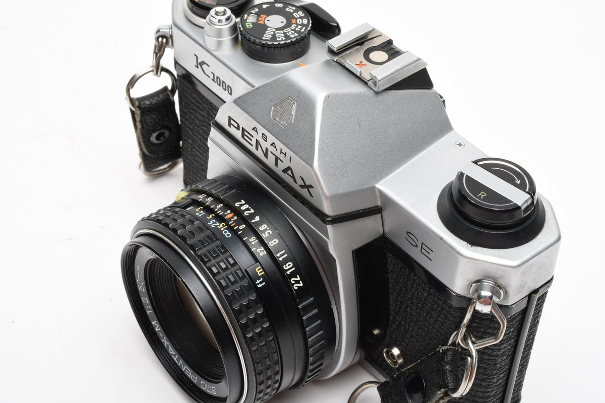 Pentax K1000 SE 35mm SLR w/50mm f2 lens, New seals, strap, case, Great!
