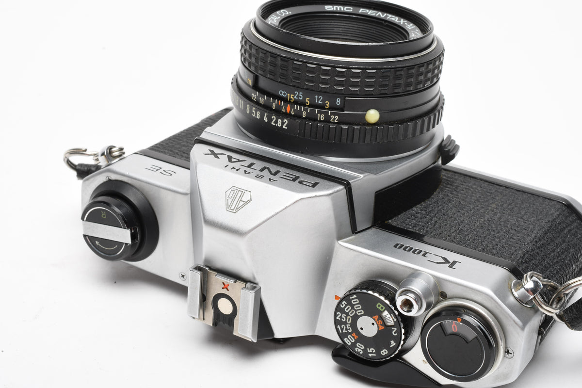 Pentax K1000 SE 35mm SLR w/50mm f2 lens, New seals, strap, case, Great!