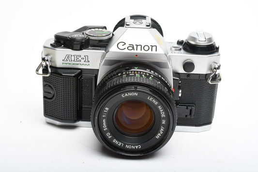 Canon AE-1 Program 35mm SLR Camera w/50mm f1.8, New Seals, Manual, Full CLA