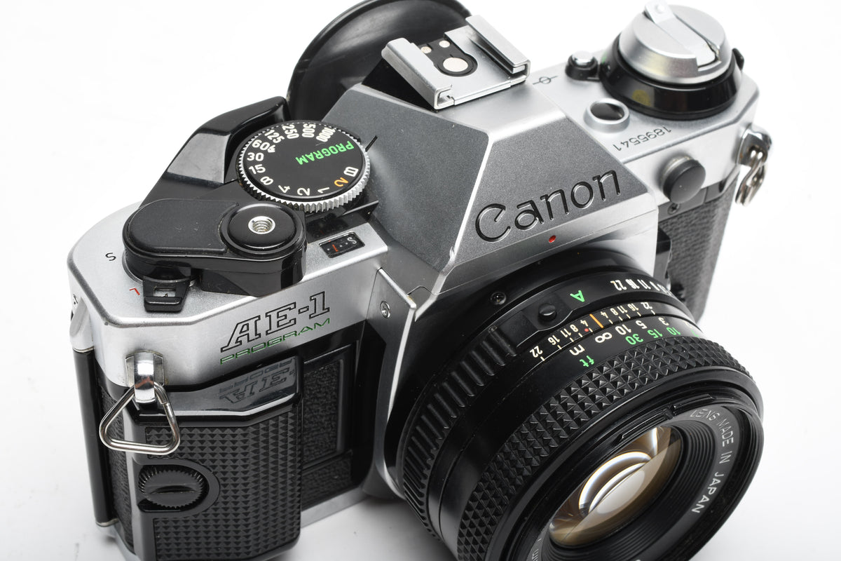 Canon AE-1 Program 35mm SLR Camera w/50mm f1.8, New Seals, Manual, Full CLA