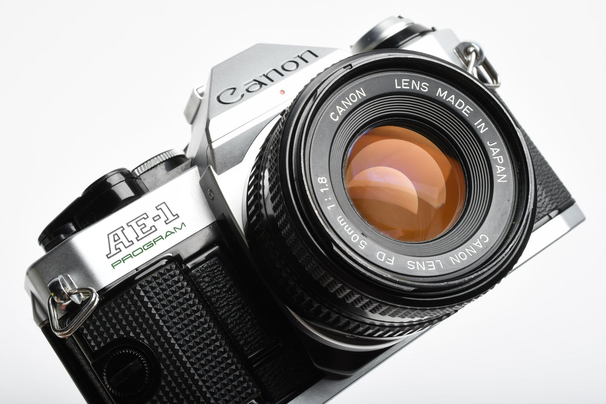 Canon AE-1 Program 35mm SLR Camera w/50mm f1.8, New Seals, Manual, Full CLA