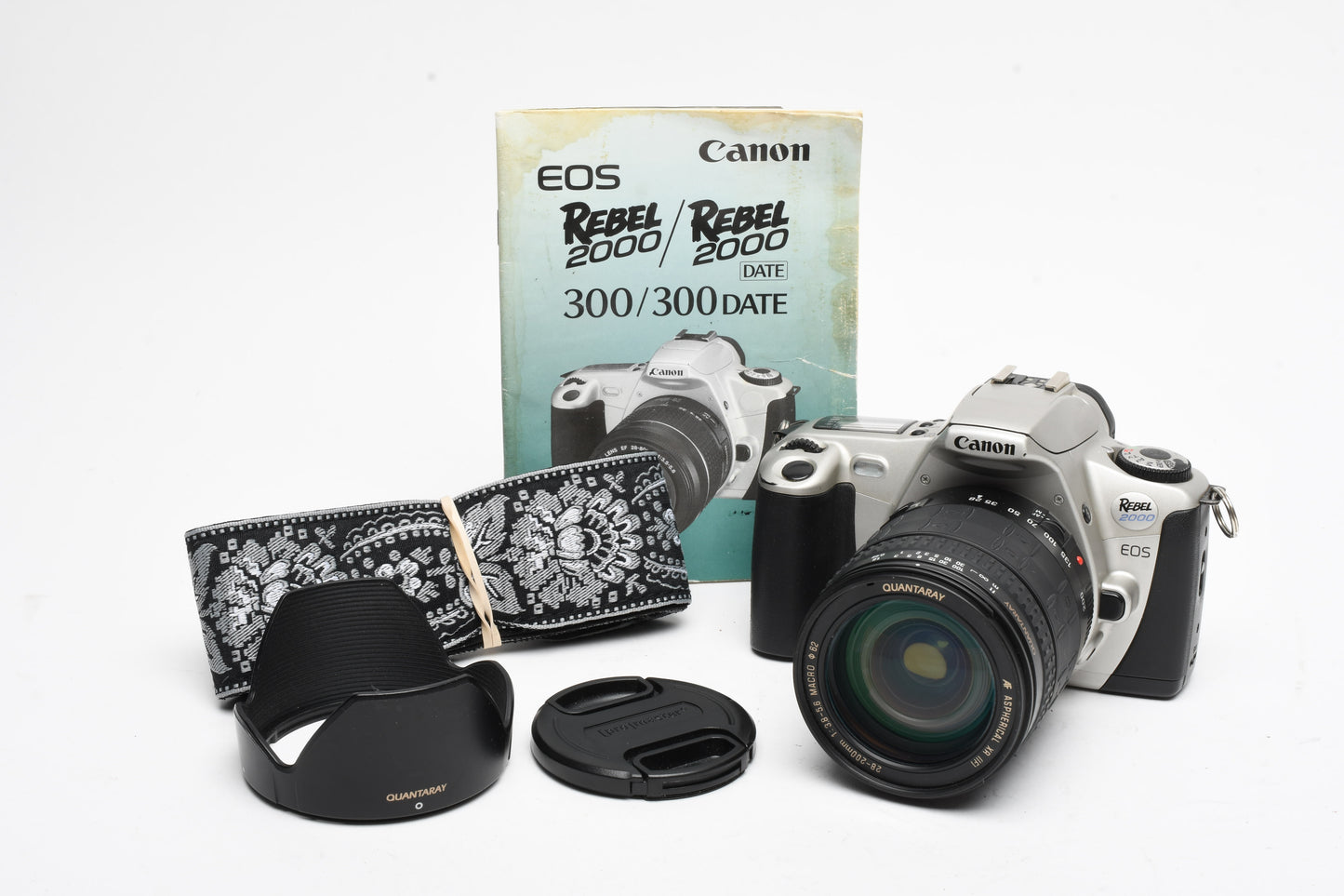 Canon Rebel 2000 35mm SLR w/EF 28-200mm f3.8-5.6 zoom lens, strap, manual