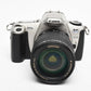 Canon Rebel 2000 35mm SLR w/EF 28-200mm f3.8-5.6 zoom lens, strap, manual