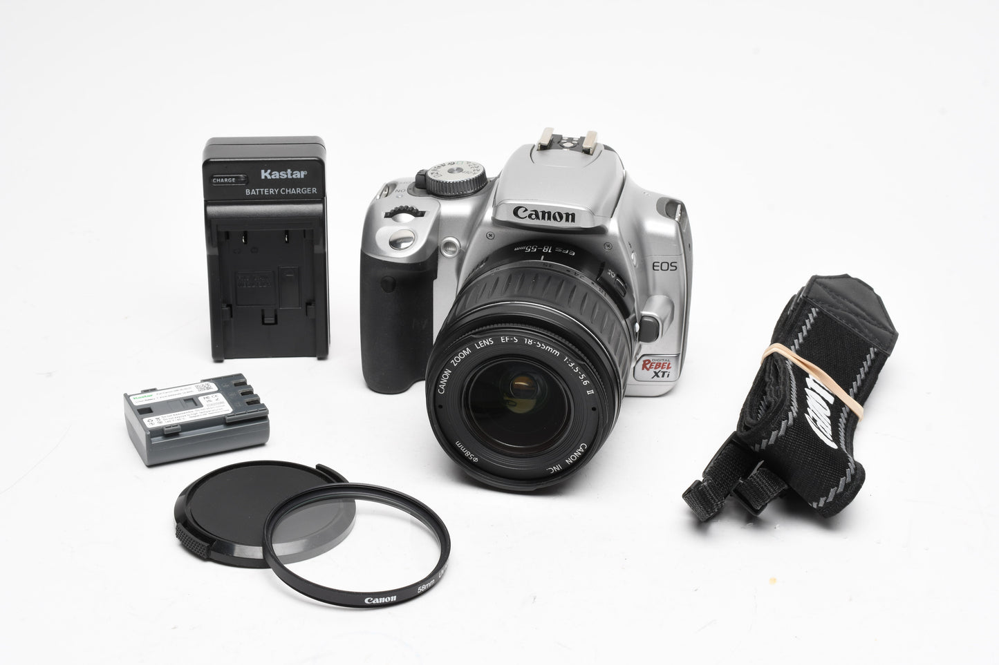 Canon Rebel XTi Silver DSLR w/18-55mm f3.5-5.6 II Zoom Lens, UV, Strap, Batt, Charger