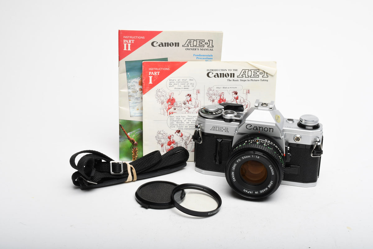 Canon AE-1 35mm SLR Camera w/50mm f1.8 Lens, UV, New Seals! Very clean!