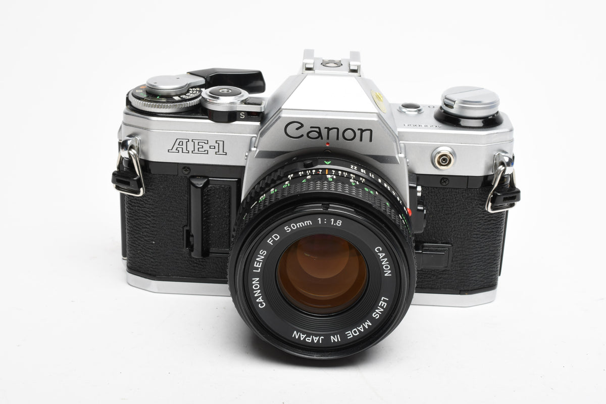 Canon AE-1 35mm SLR Camera w/50mm f1.8 Lens, UV, New Seals! Very clean!