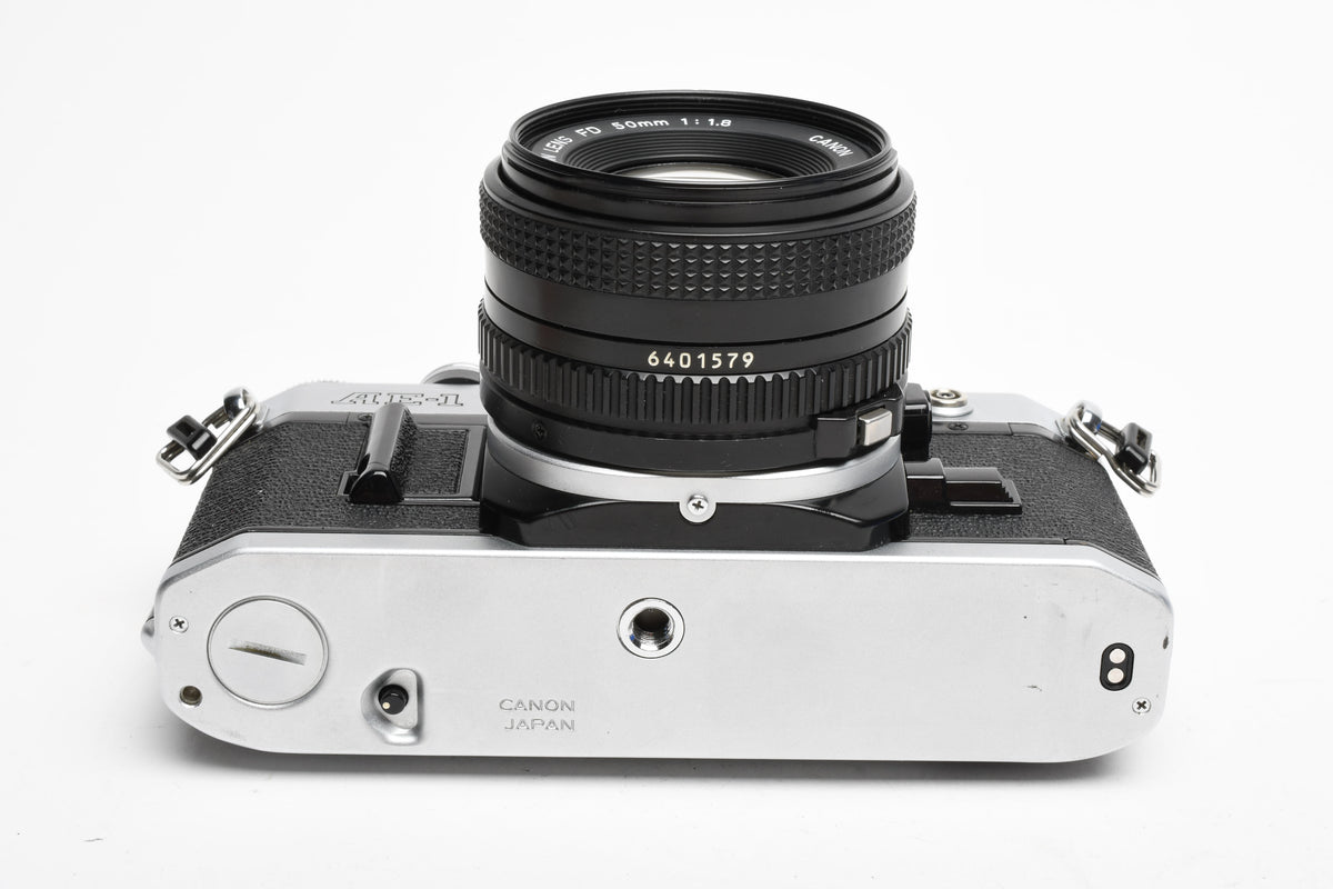 Canon AE-1 35mm SLR Camera w/50mm f1.8 Lens, UV, New Seals! Very clean!