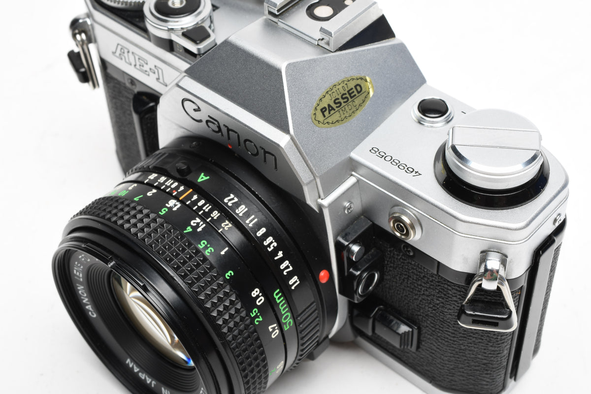Canon AE-1 35mm SLR Camera w/50mm f1.8 Lens, UV, New Seals! Very clean!