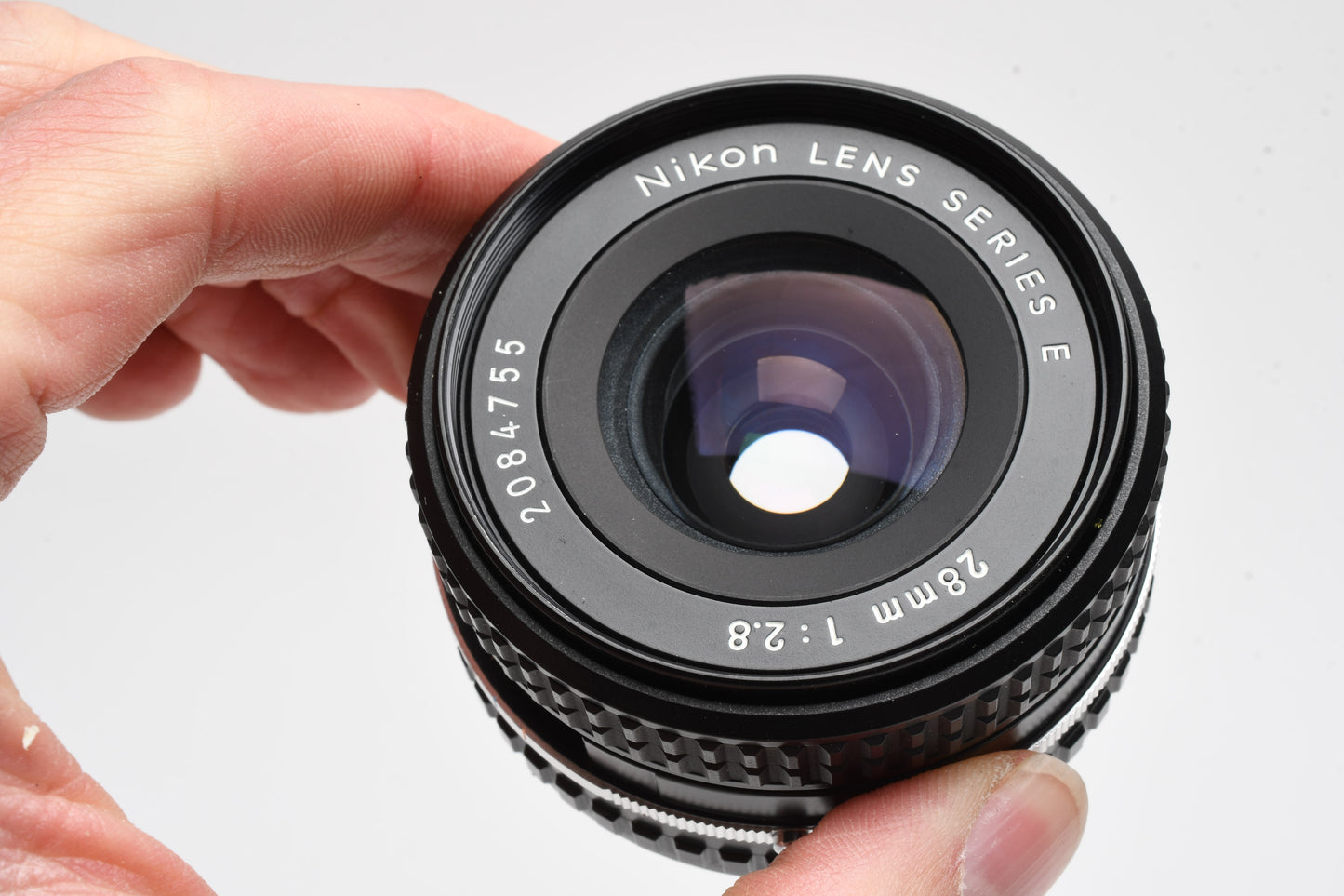 Nikon Series E 28mm f2.8 Wide angle lens, caps, good *Read