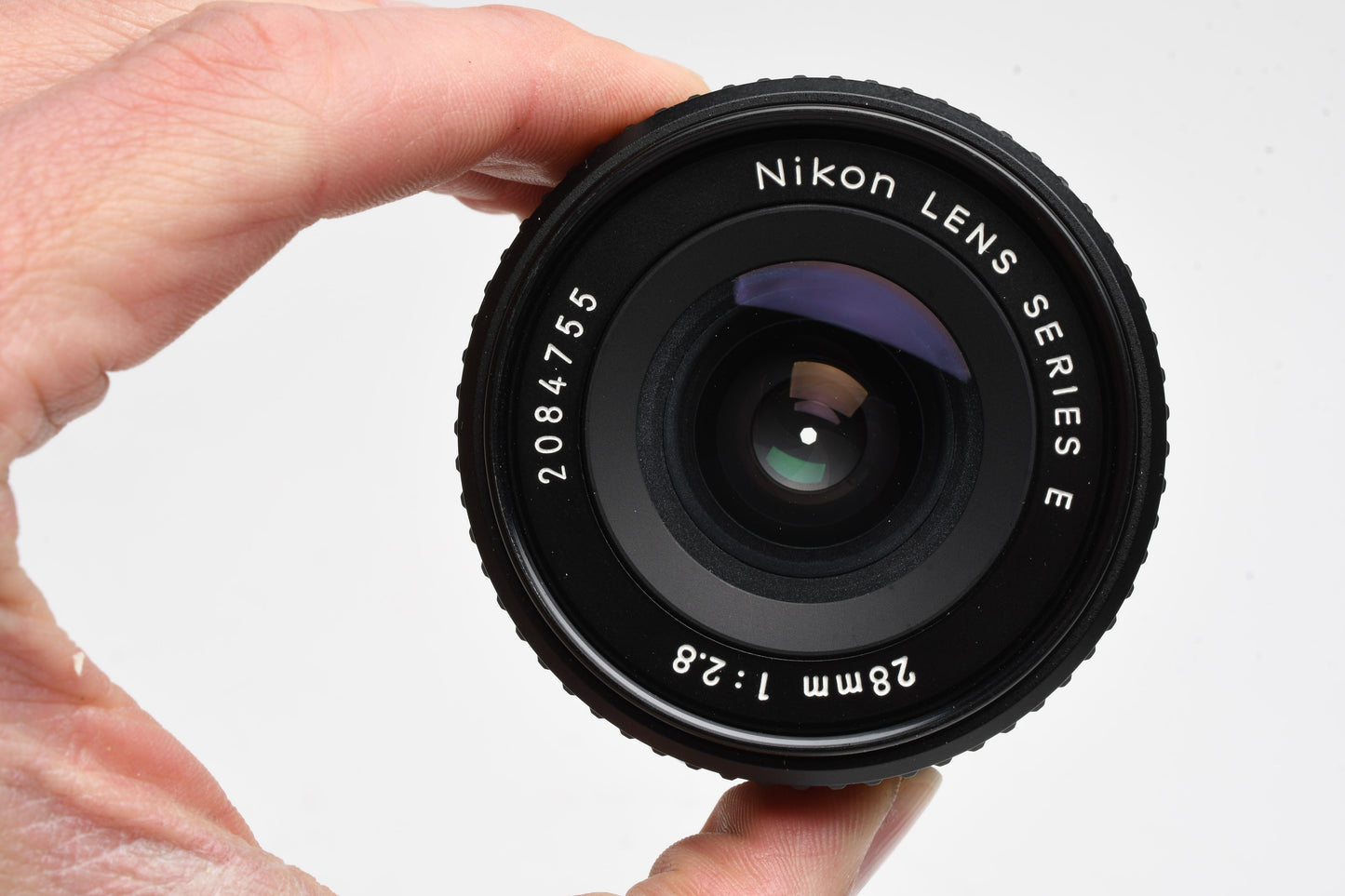 Nikon Series E 28mm f2.8 Wide angle lens, caps, good *Read