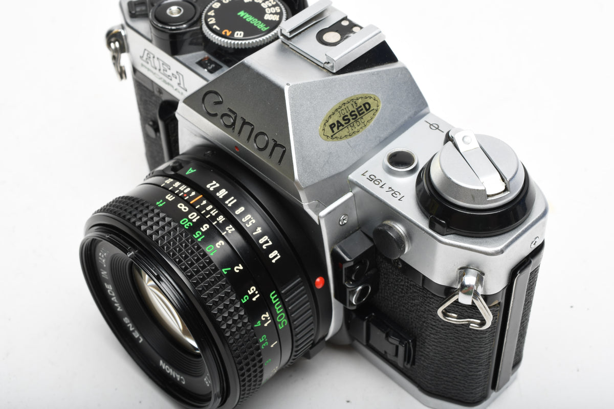 Canon AE-1 Program 35mm SLR Camera w/50mm f1.8, New Seals, Manual, Nice