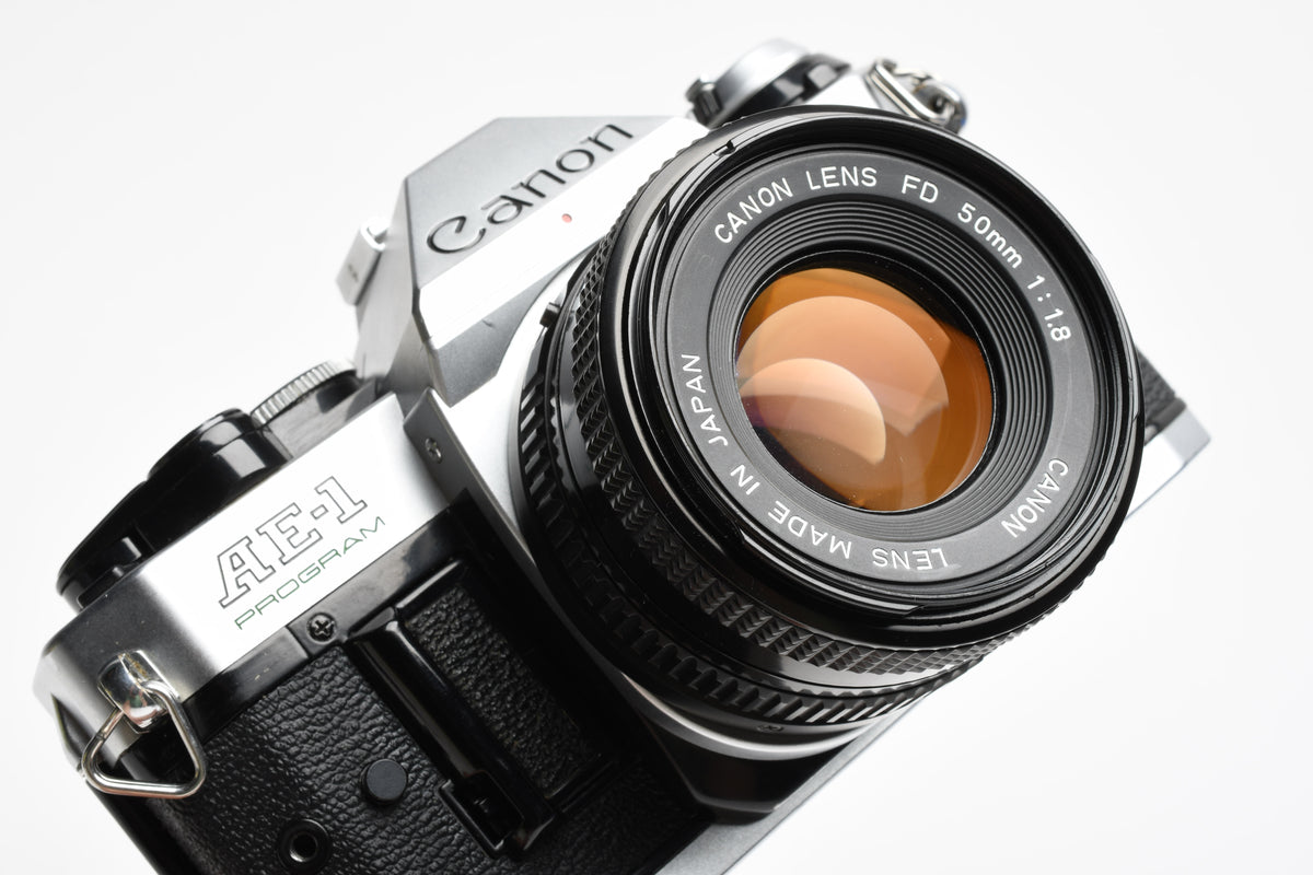 Canon AE-1 Program 35mm SLR Camera w/50mm f1.8, New Seals, Manual, Nice