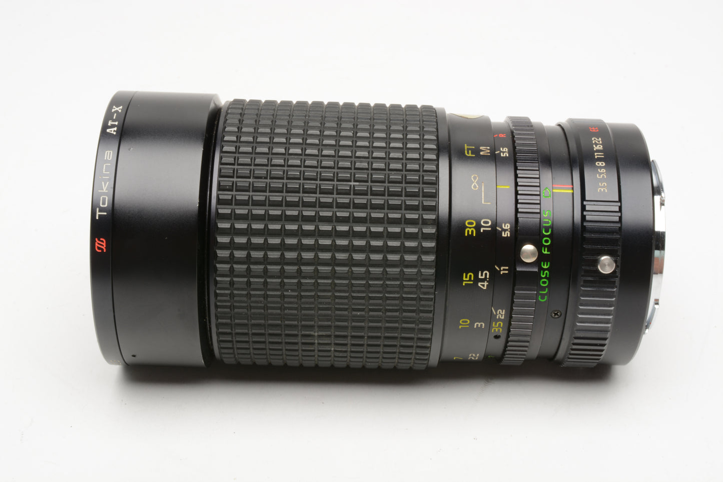 Tokina AT-X 352 35-200mm f3.5-4.5 for Konica zoom lens, boxed + UV