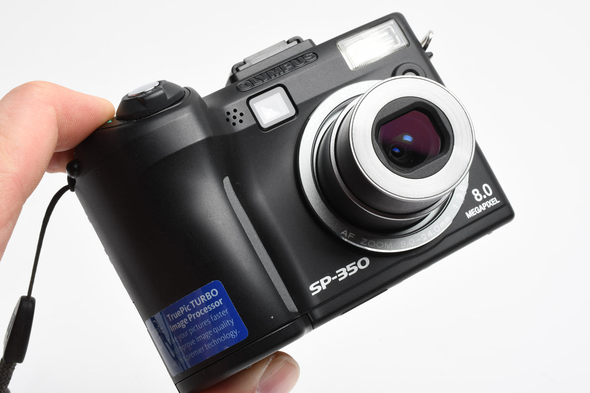 Olympus SP-350 8MP Digital Point&Shoot camera, strap, 1GB XD, Great