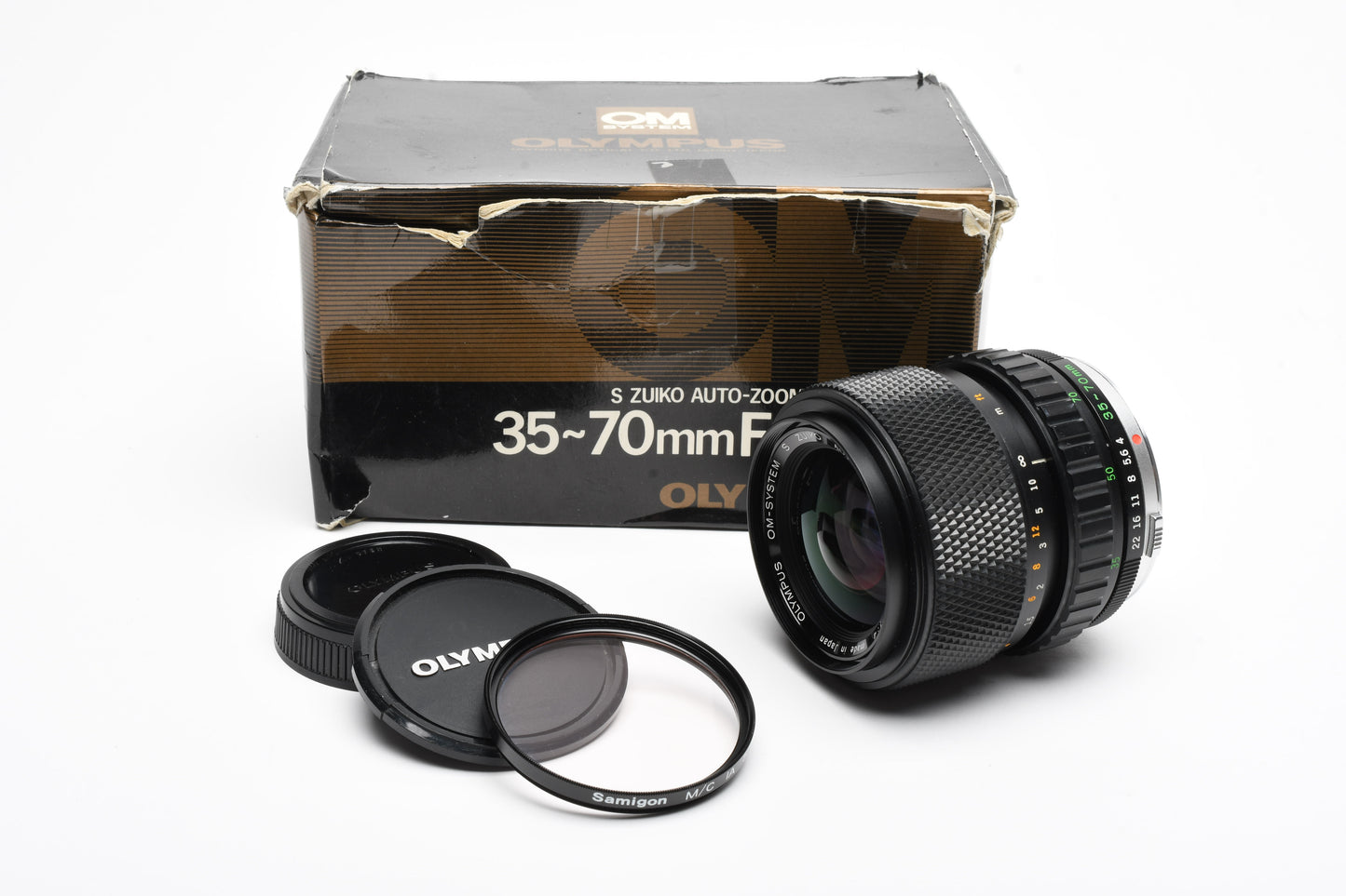 Olympus OM Zuiko 35-70mm f4 Zoom lens, 1A+Caps, Mint- Box