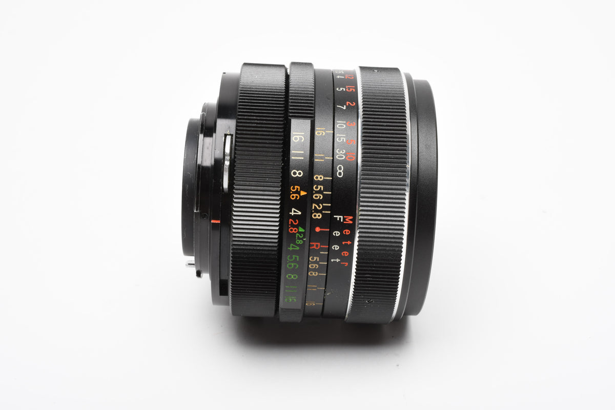 Vivitar 28mm f2.8 wide angle lens for Nikon F Mount, caps, pouch, clean