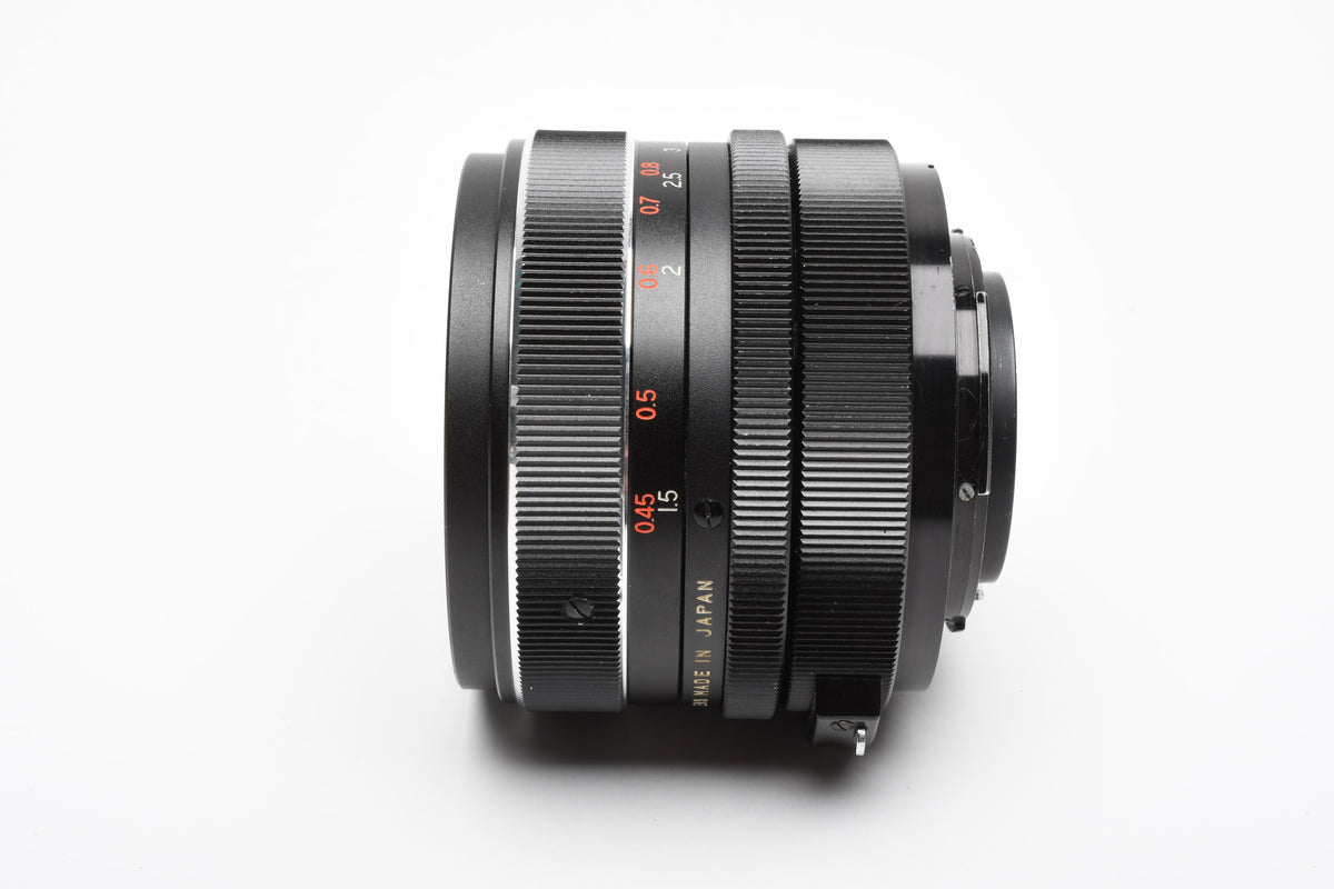 Vivitar 28mm f2.8 wide angle lens for Nikon F Mount, caps, pouch, clean