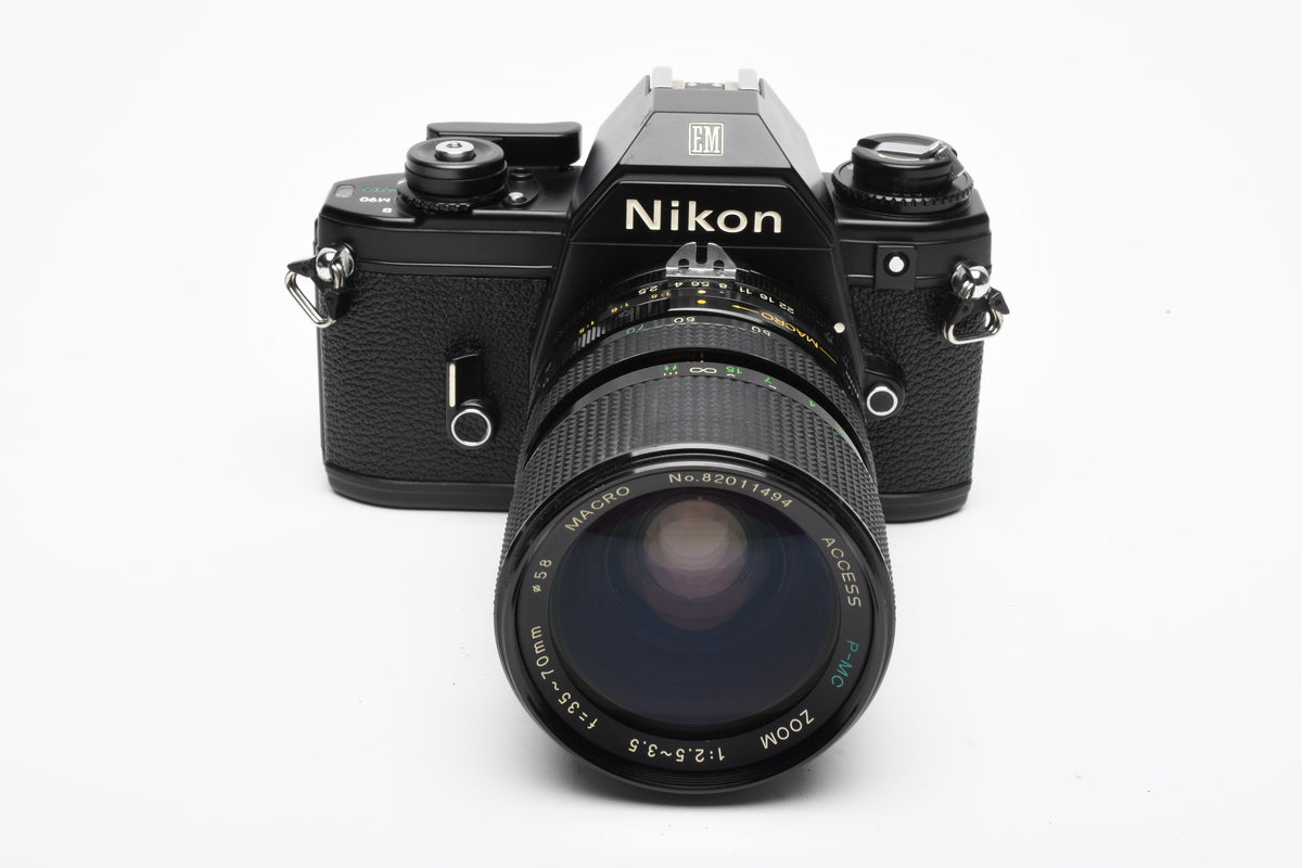 Nikon EM 35mm SLR w/Access 35-70mm zoom, Strap, New Seals, Great!