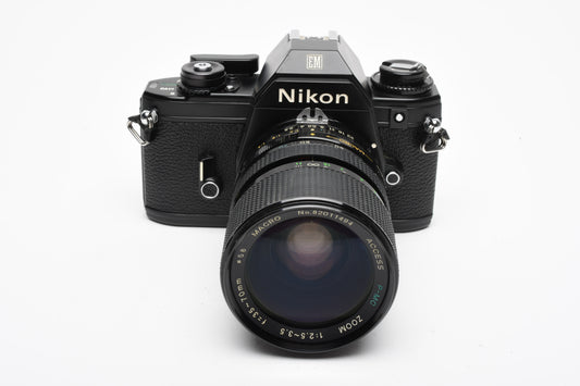 Nikon EM 35mm SLR w/Access 35-70mm zoom, Strap, New Seals, Great!