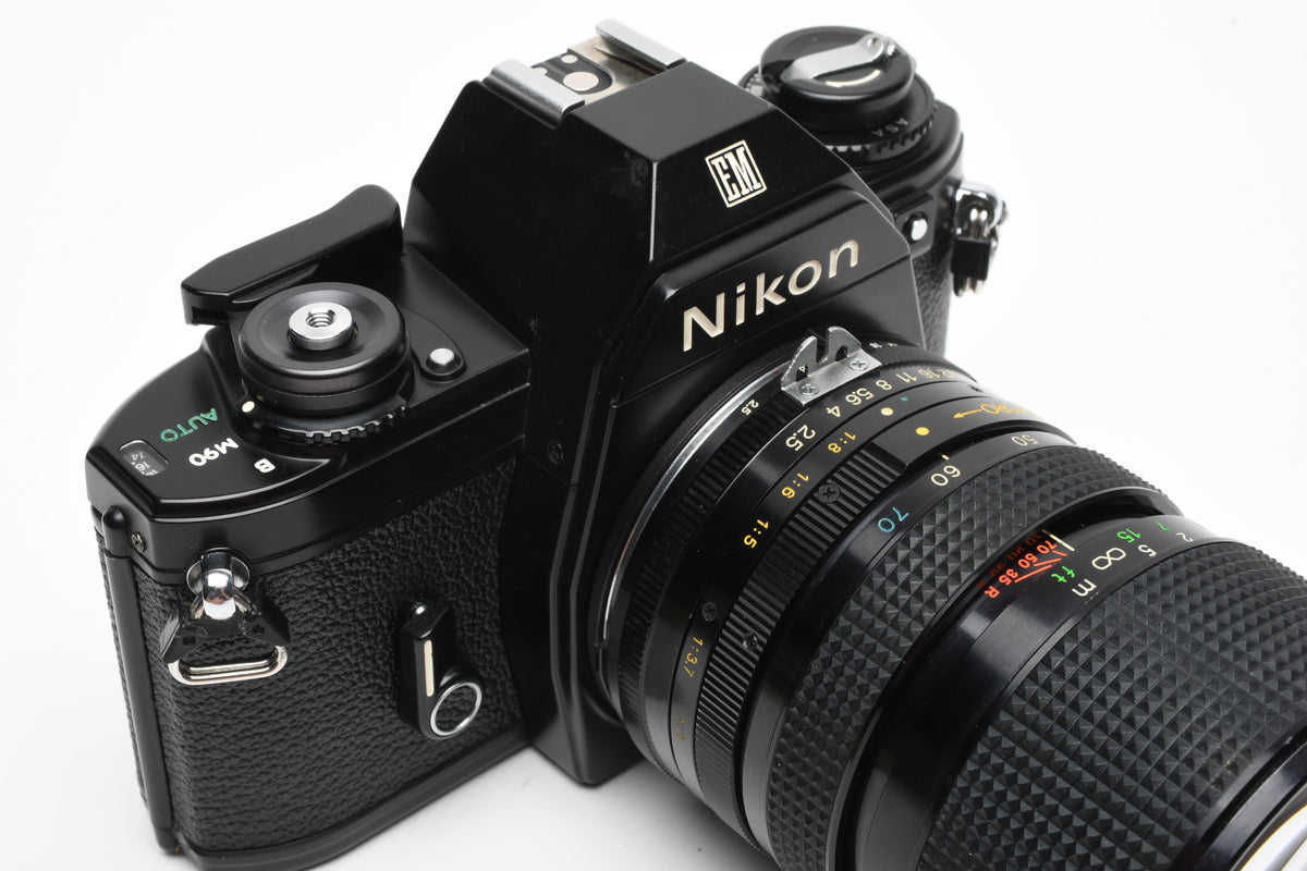 Nikon EM 35mm SLR w/Access 35-70mm zoom, Strap, New Seals, Great!