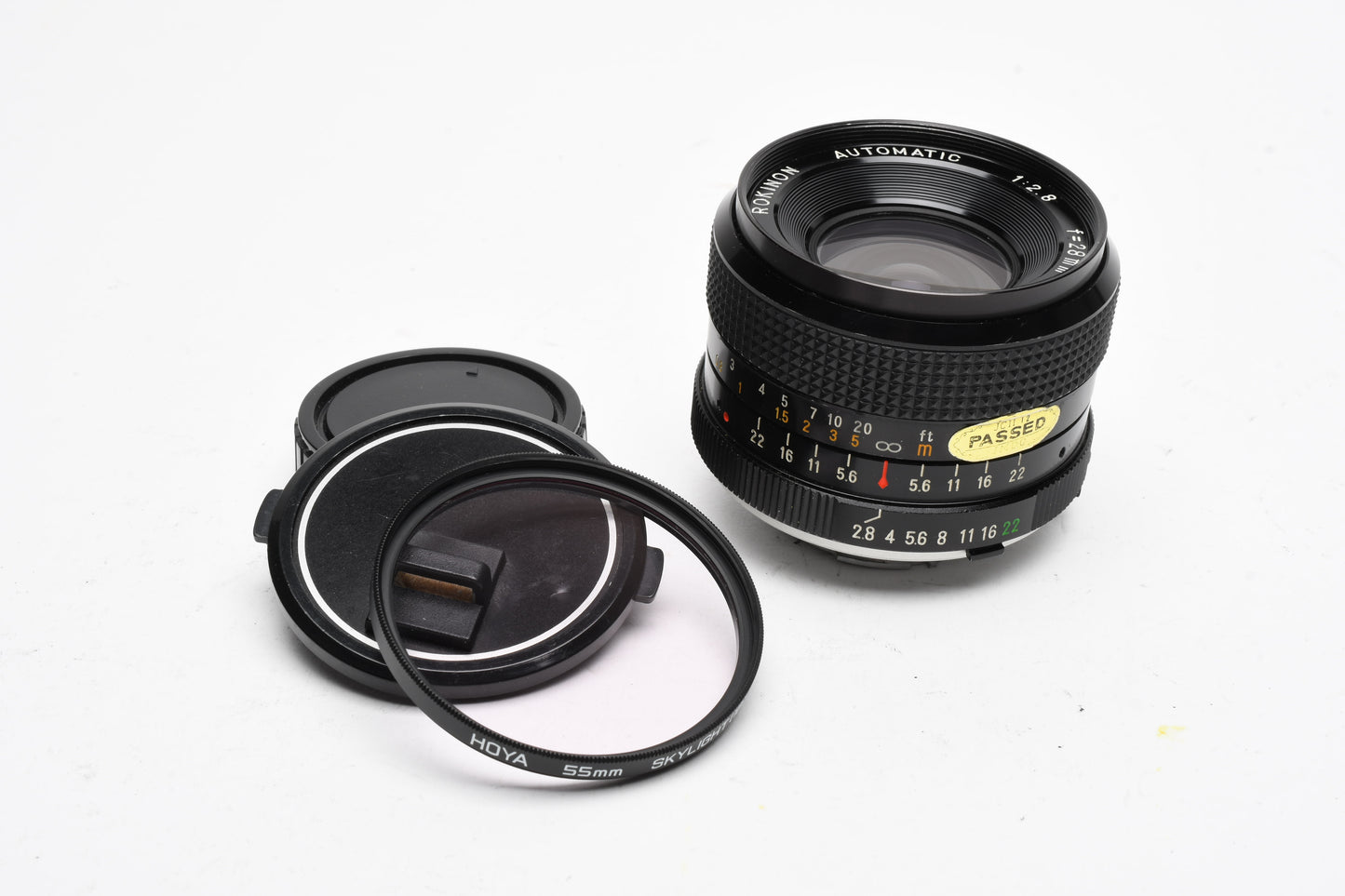 Rokinon 28mm f2.8 wide lens for Minolta MD Mount + Skylight filter