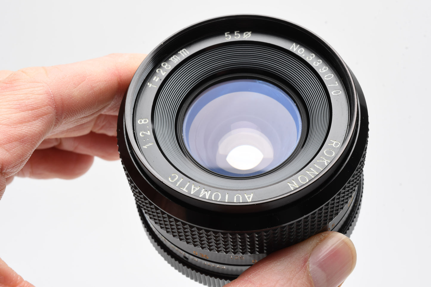 Rokinon 28mm f2.8 wide lens for Minolta MD Mount + Skylight filter