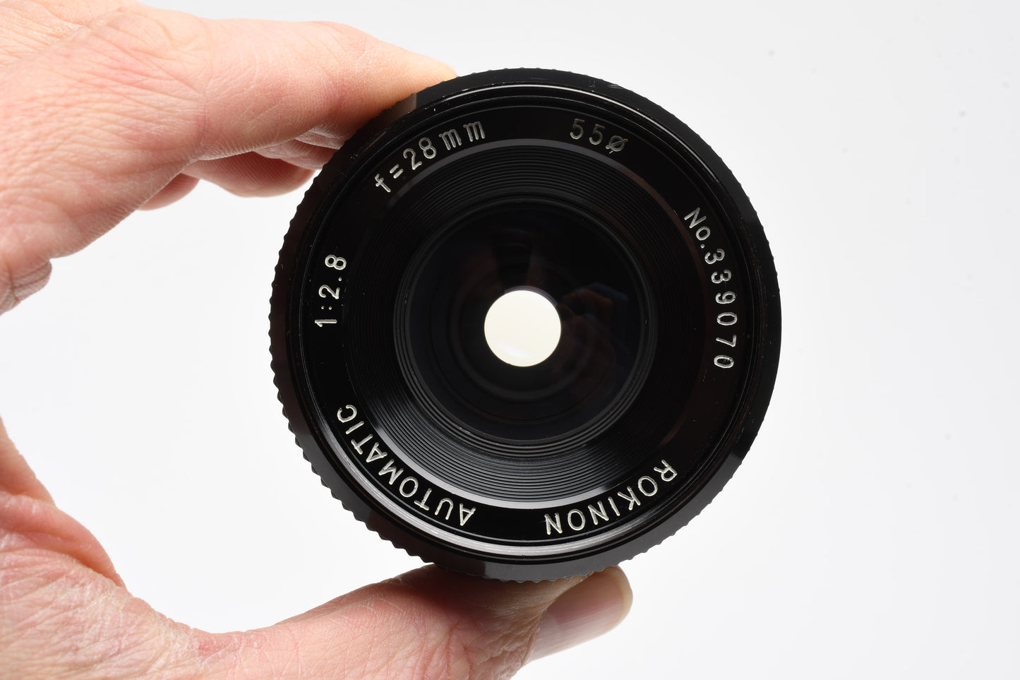 Rokinon 28mm f2.8 wide lens for Minolta MD Mount + Skylight filter