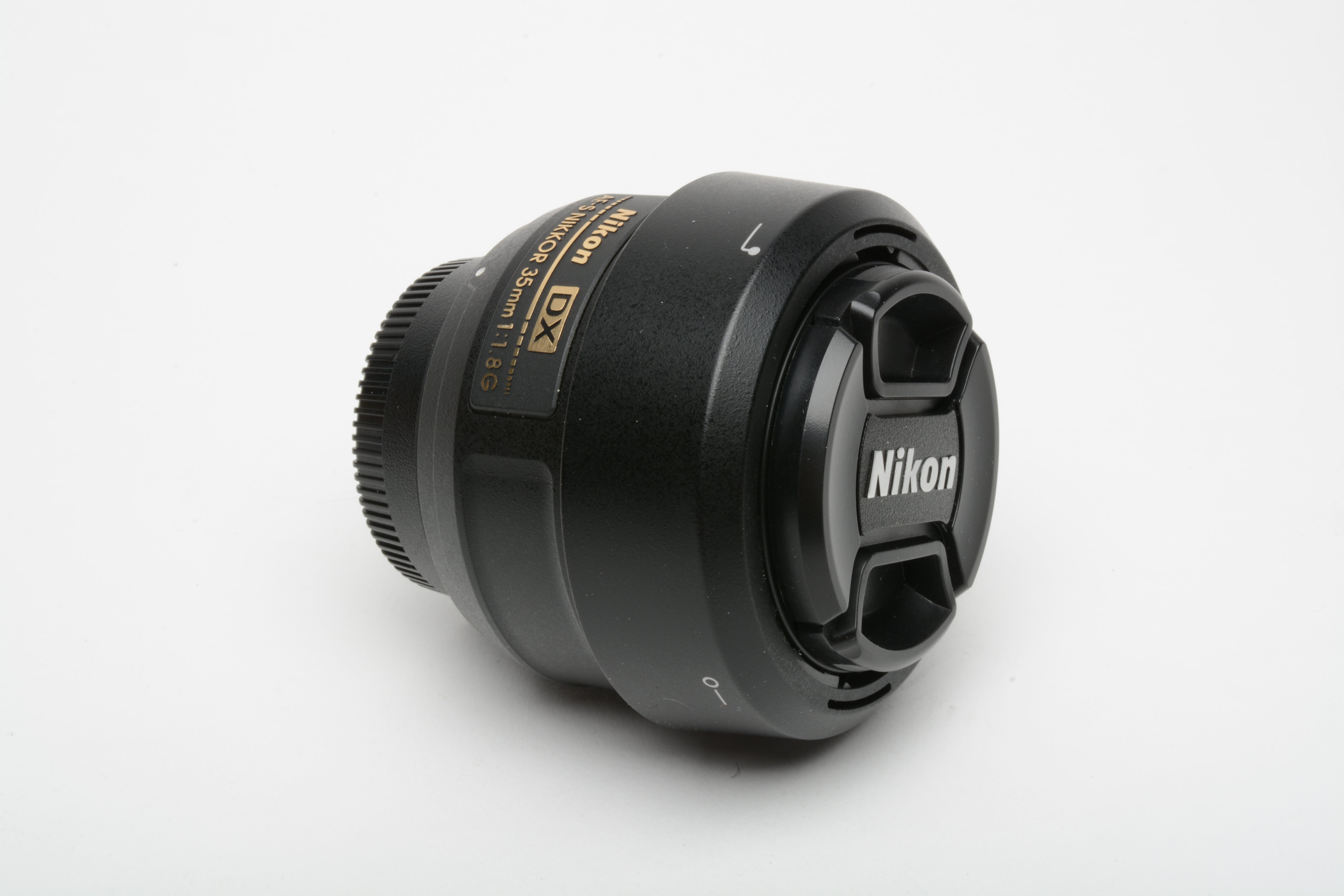 Nikon AF-S Nikkor 35mm f1.8G DX lens, caps, HB-46 hood, Mint, Boxed