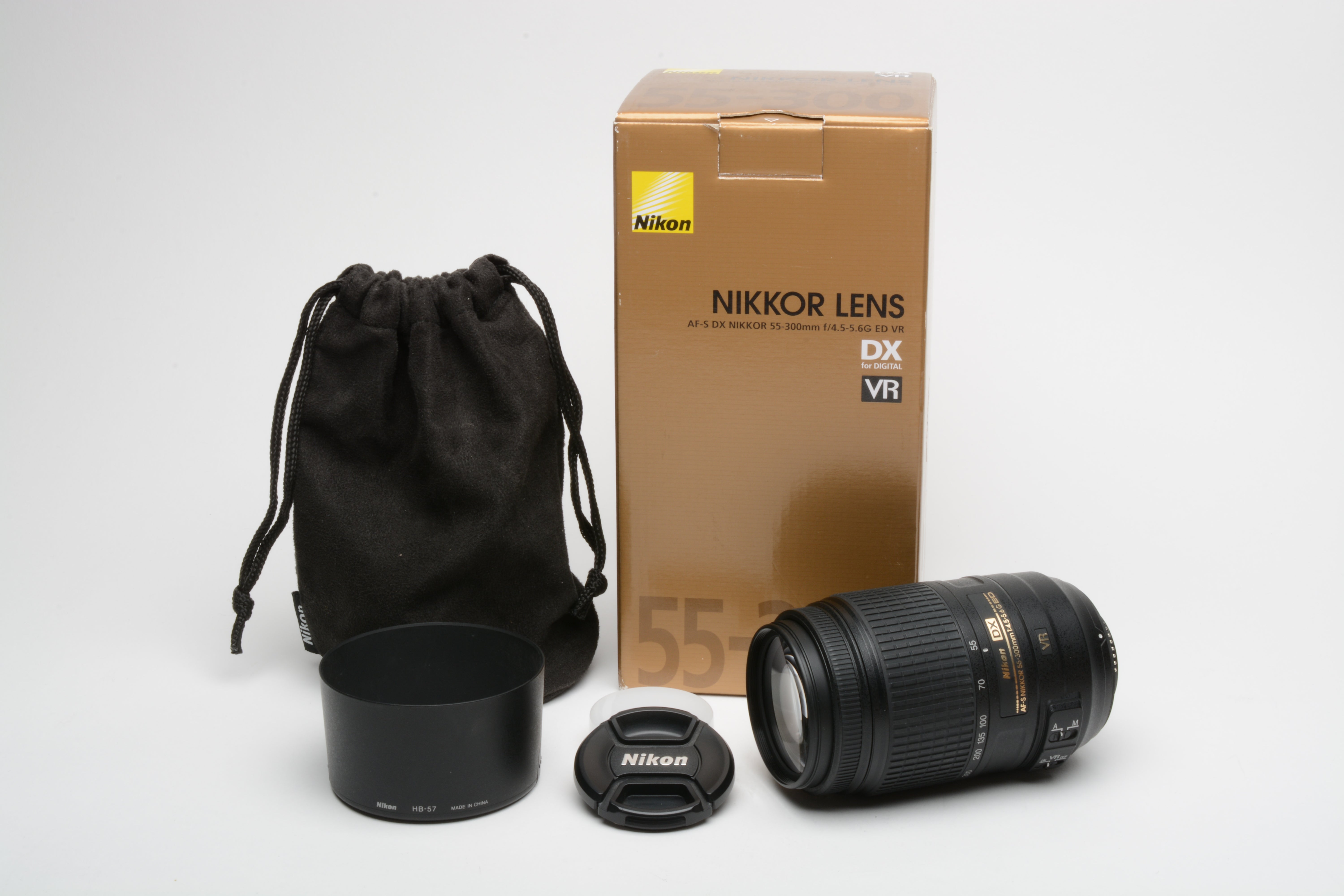 Nikon AF-S Nikkor 55-300mm f4.5-5.6G ED lens, hood, caps, pouch