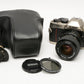 Nikon FM-10 35mm SLR w/35-70mm f3.5-4.8 zoom lens, cap+strap+pola, Great!
