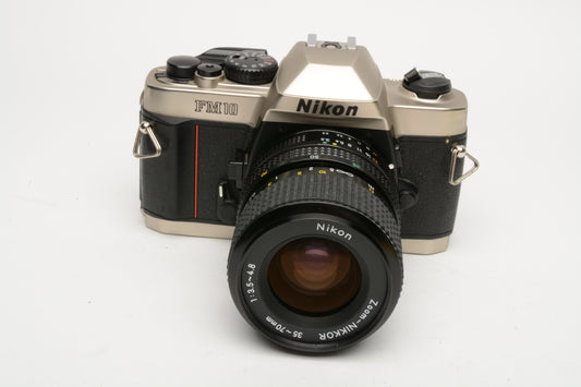 Nikon FM-10 35mm SLR w/35-70mm f3.5-4.8 zoom lens, cap+strap+pola, Great!