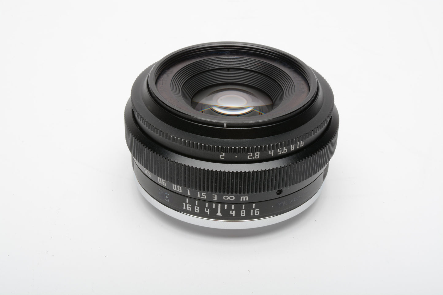 7 Artisans DJ Optical 25mm f2 Fujifilm X Mount lens, caps + pouch