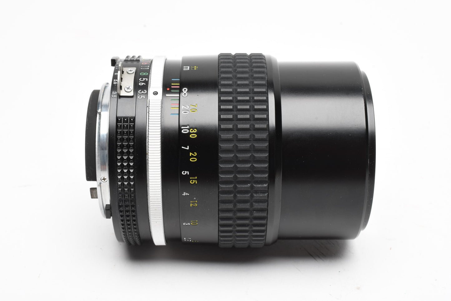Nikon Nikkor AI 135mm f2.8 lens, caps, very sharp