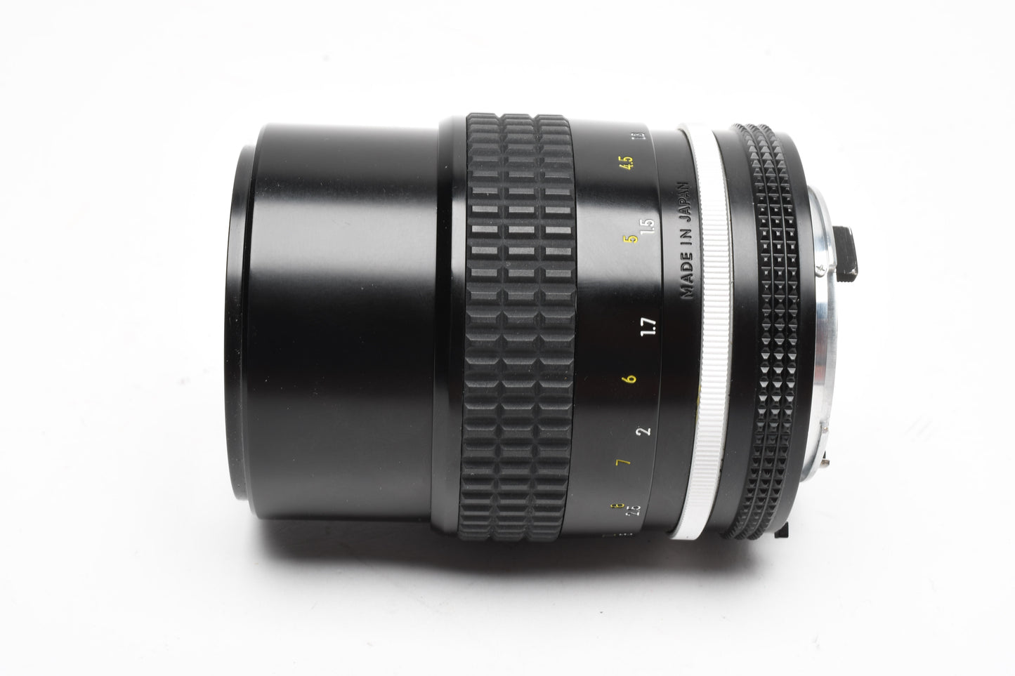 Nikon Nikkor AI 135mm f2.8 lens, caps, very sharp