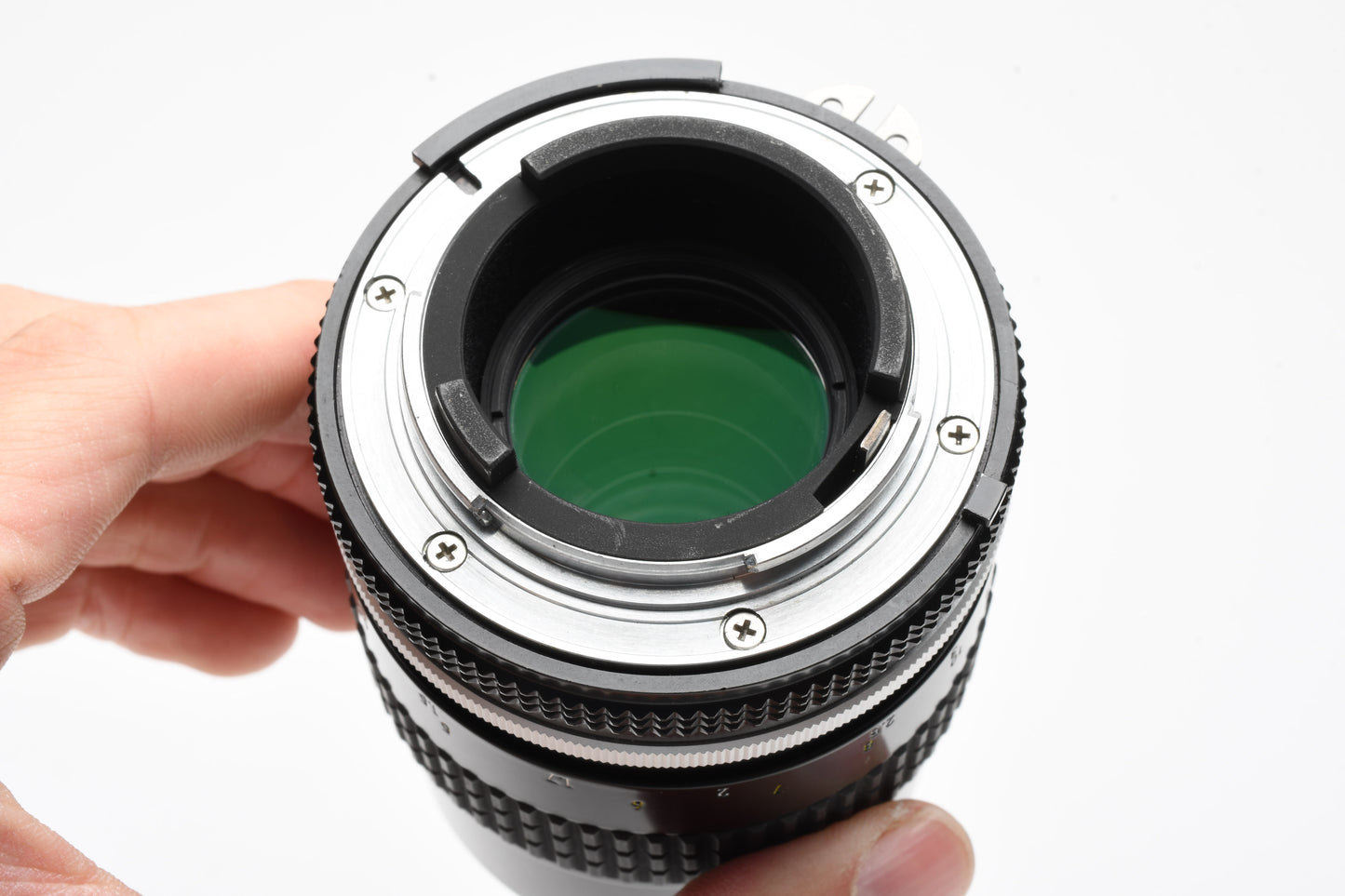 Nikon Nikkor AI 135mm f2.8 lens, caps, very sharp