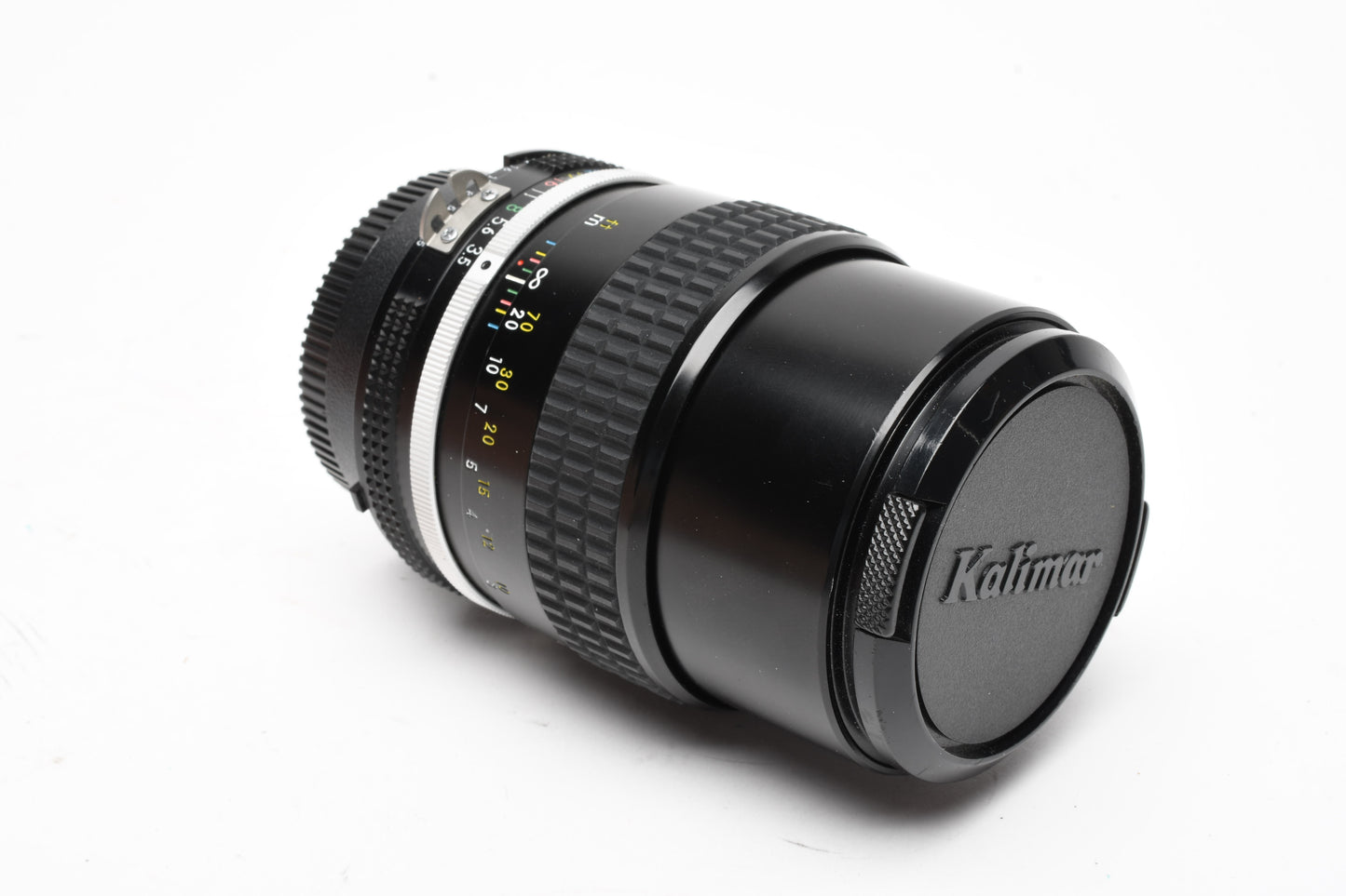 Nikon Nikkor AI 135mm f2.8 lens, caps, very sharp