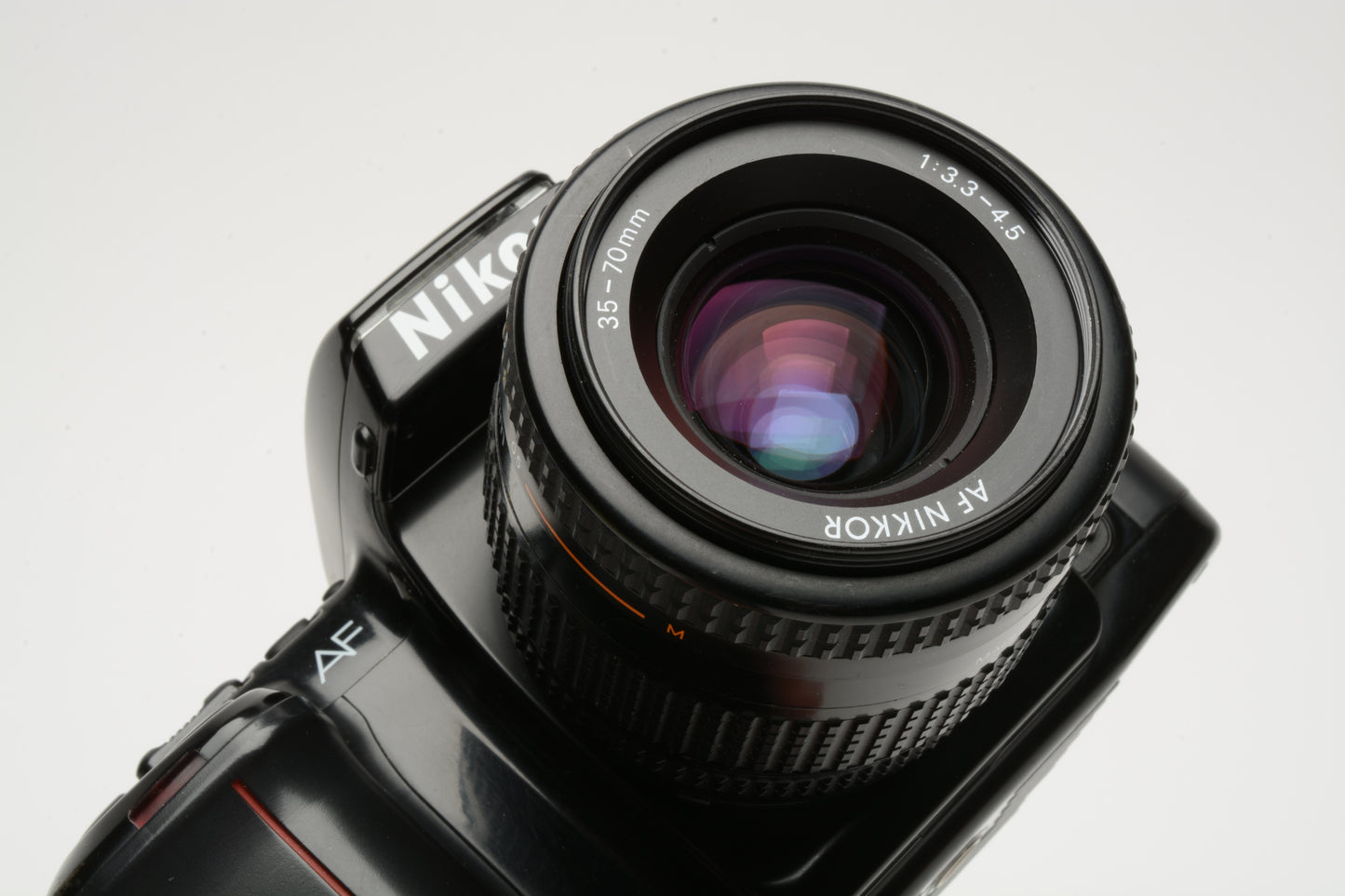 Nikon N6006 35mm SLR w/AF 35-70mm f3.3-4.5 zoom lens, strap, good!