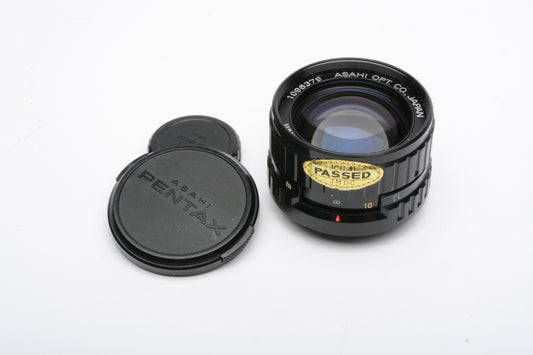 Pentax 110 50mm f2.8 lens, caps, very clean