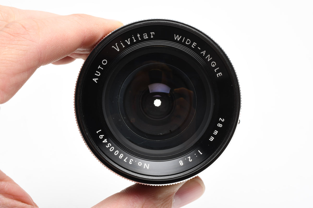 Vivitar 28mm f2.8 wide angle lens for Nikon F Mount w/Caps and UV Filter, Nice