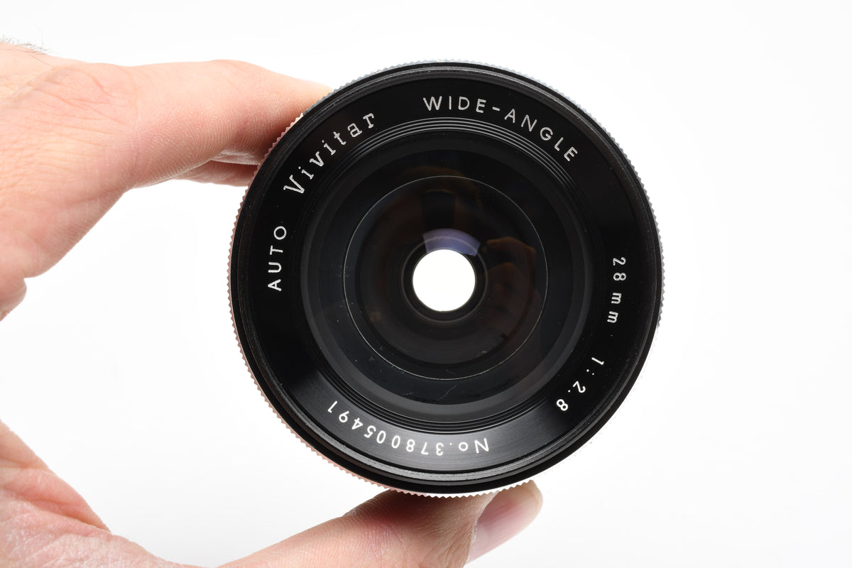 Vivitar 28mm f2.8 wide angle lens for Nikon F Mount w/Caps and UV Filter, Nice