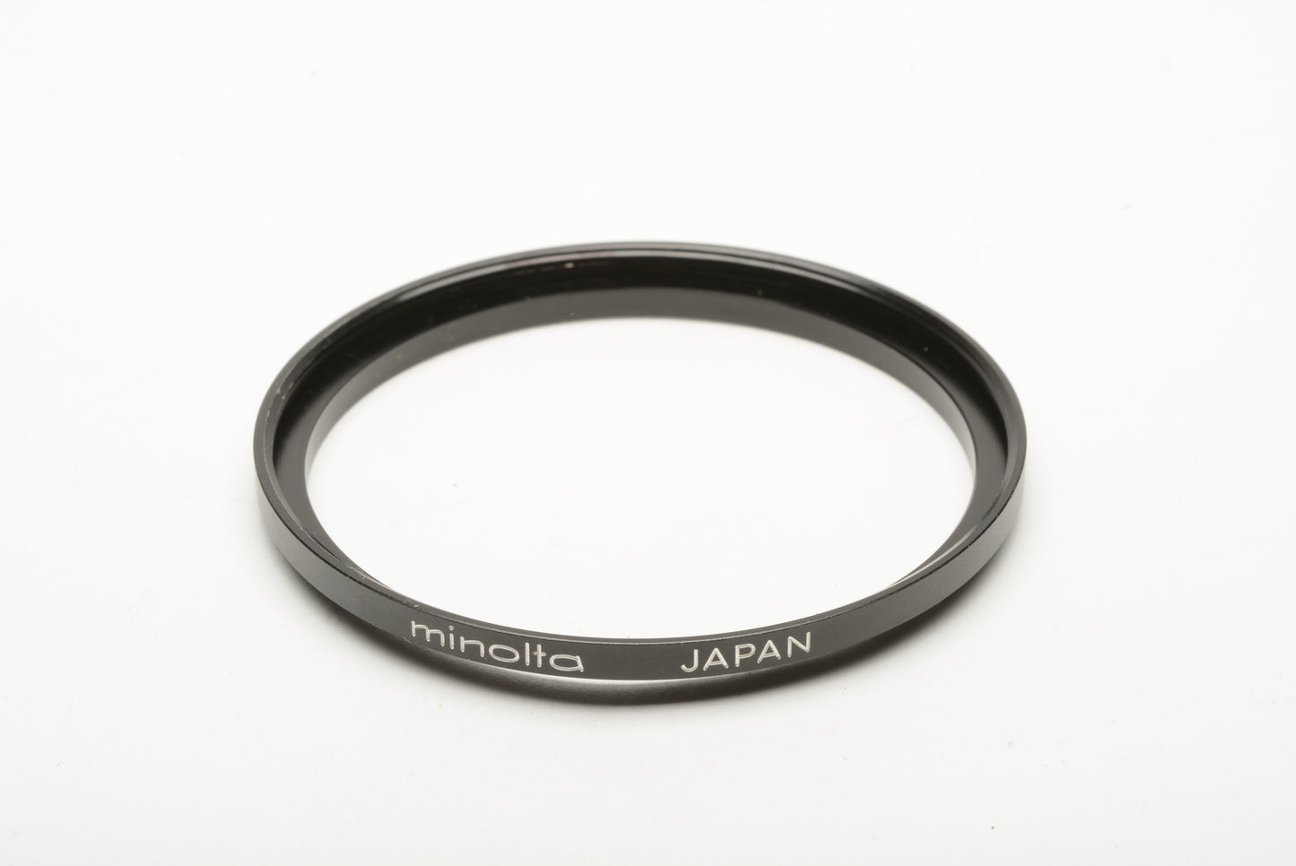 Minolta 52-55mm step up ring (55mm filters on 52mm diameter)