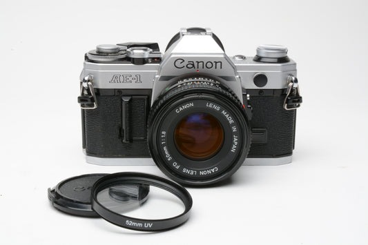 Canon AE-1 w/50mm f1.8 FD lens, new light seals, cap, UV, eyecup, tested