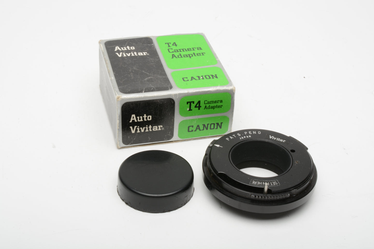 Vivitar T4 Canon adapter, New w/cap, boxed