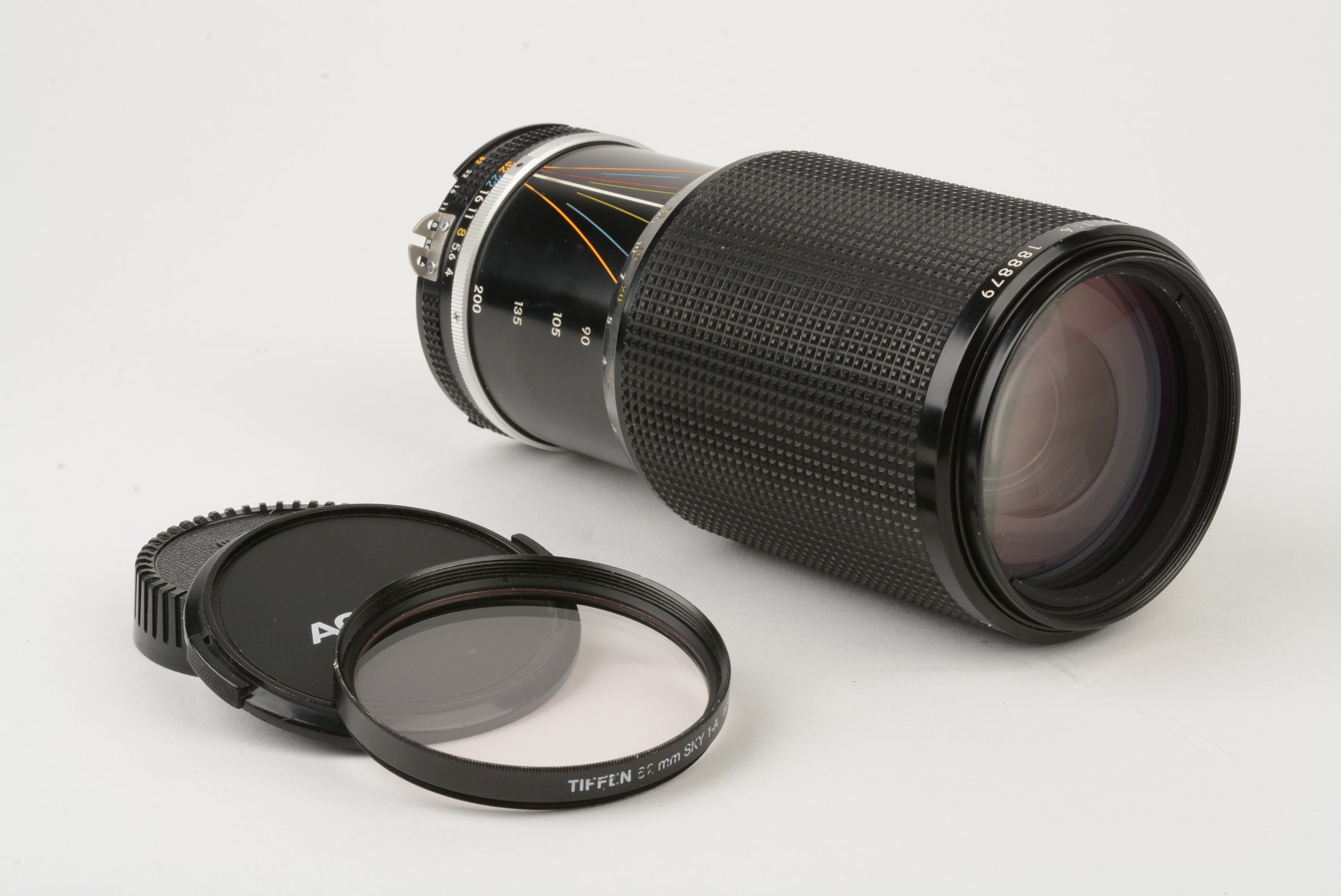 Nikon Nikkor MF 80-200mm f4 AI-S zoom lens, caps + sky filter