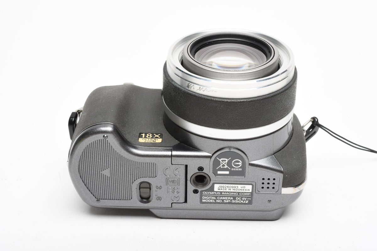 Olympus SP-550UZ 7.1MP Digital Point&Shoot w/strap, 2GB XD Card, Tested, Read*