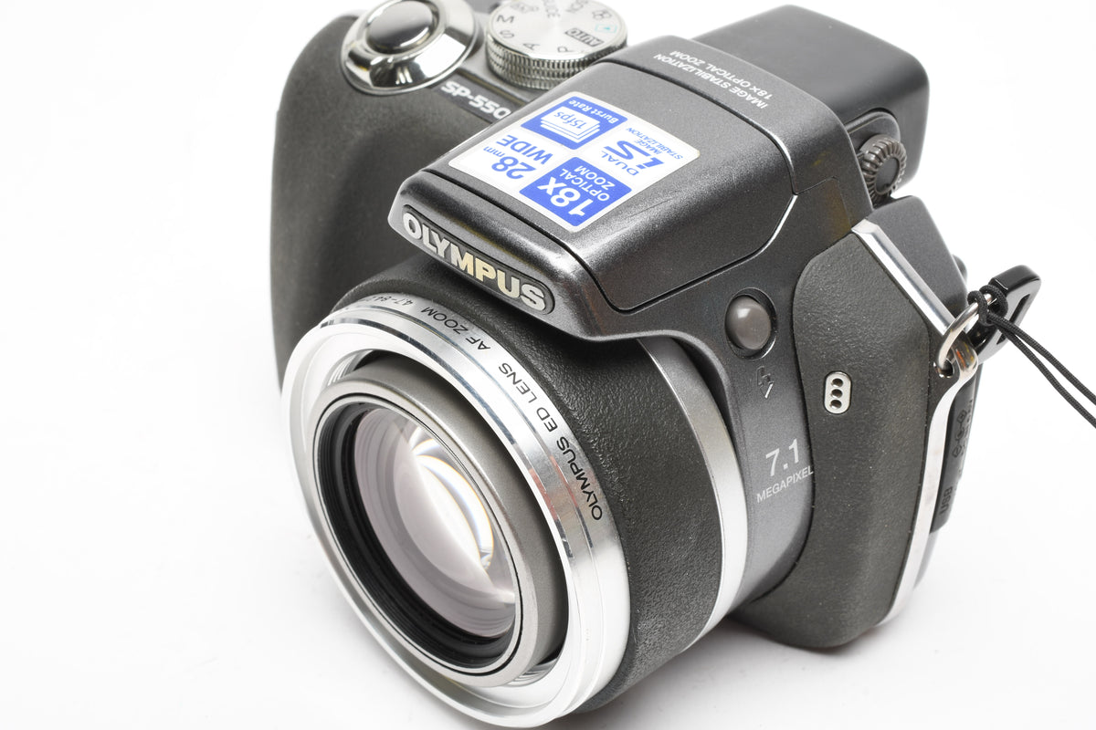 Olympus SP-550UZ 7.1MP Digital Point&Shoot w/strap, 2GB XD Card, Tested, Read*