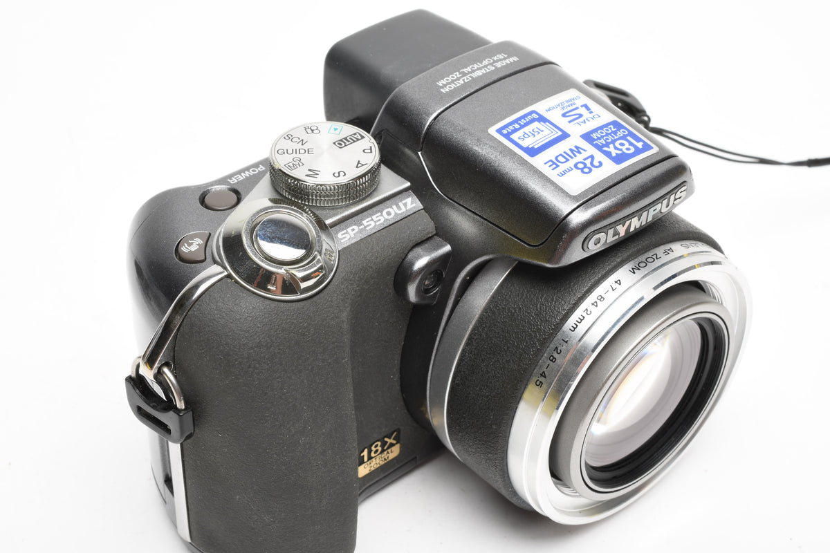 Olympus SP-550UZ 7.1MP Digital Point&Shoot w/strap, 2GB XD Card, Tested, Read*