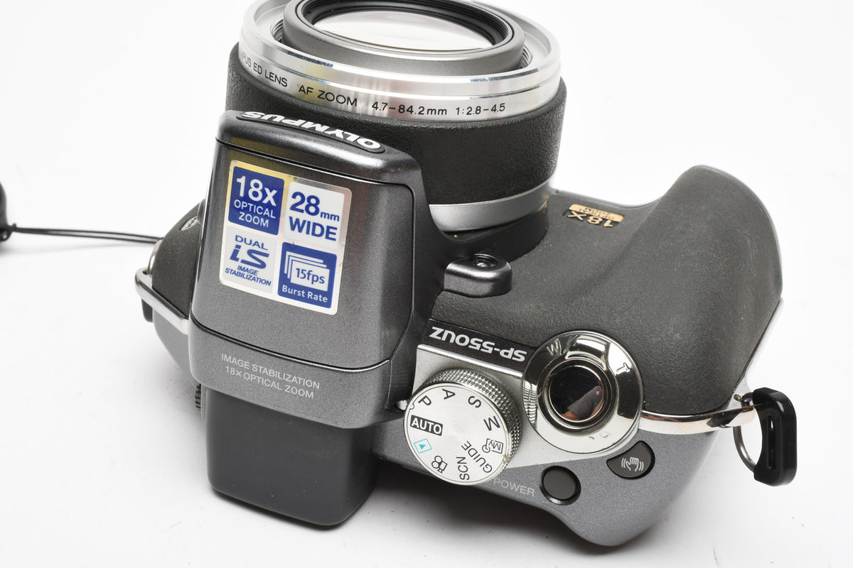 Olympus SP-550UZ 7.1MP Digital Point&Shoot w/strap, 2GB XD Card, Tested, Read*