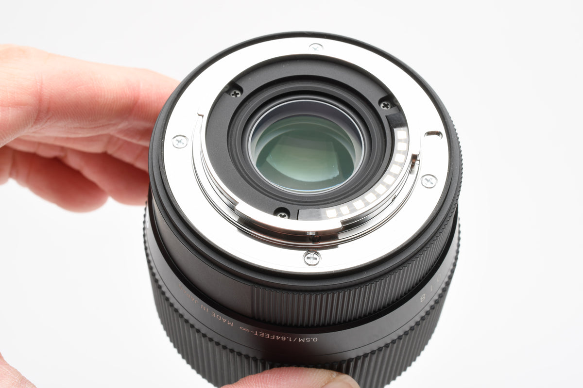 Sigma 56mm f1.4 DC DN C lens for X-Mount w/Hood and caps, Great!